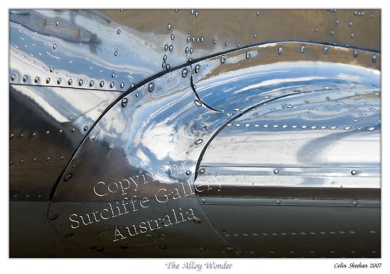 AC01.jpg - The shining detail of a well restored aircraft is a scene of interesting texture & reflections.