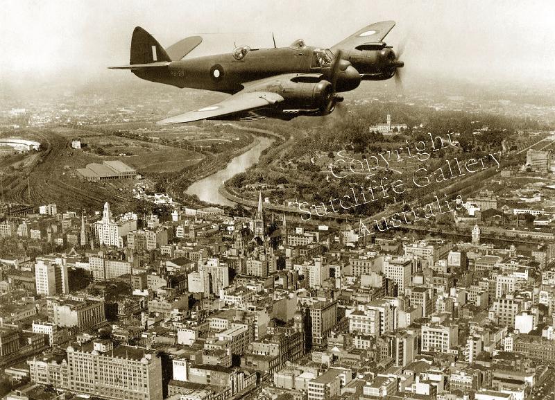AC24.jpg - A Bristol Beaufighter over the central business district of Melbourne, 1944.  Very interesting indeed. Not available in colour.