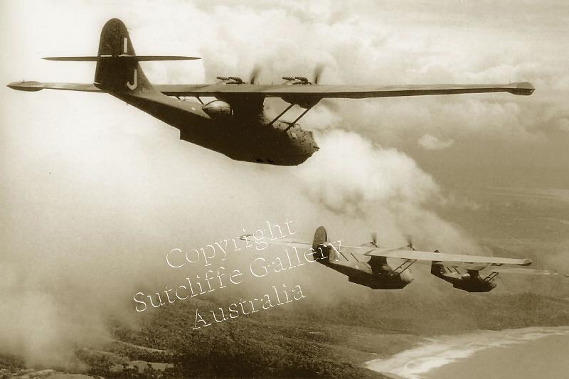 AC28.jpg - A trio of "Black Cats", RAAF Catalinas approaching enemy territory during WWII. Not available in colour.