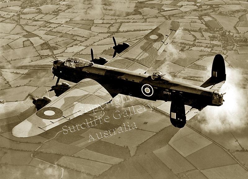 AC29.jpg - A very good image of a Lancaster flying on one engine over England, WWII. Not available in colour.