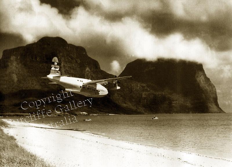 AC42.jpg - Fabulous shot of an Ansett Airways flying boat landing in the bay at Lord Howe Island. "The Honeymoon Special" Not available in colour. Available in larger sizes.